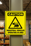 Caution sign for industrial vehicles operating 
