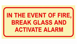 In the event of fire, break glass to activate alarm photoluminescent Safety Sign (F44) - SABS/SANS Approved
