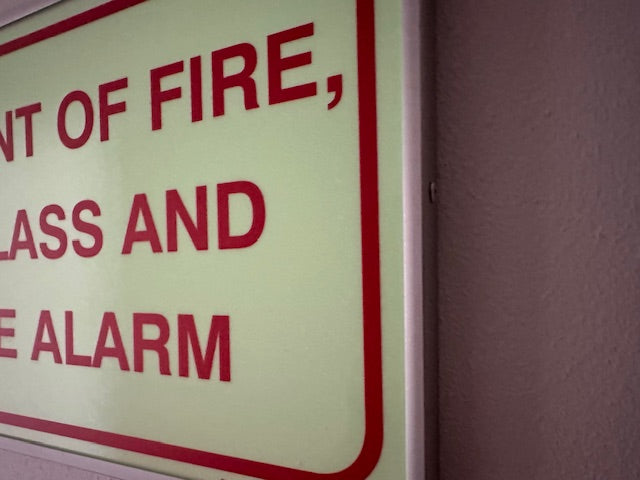 In the event of fire, break glass to activate| Safety Sign Online