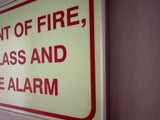 SABS In the event of fire, break glass to activate alarm photoluminescent (glow in the dark) sign (F44)