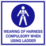 Wearing of harness compulsory when using ladder safety sign (WE030)